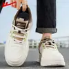 Zapatillas para hombre Huili 2026 otoño nuevo de moda cómodas de cuero zapatos casuales para estudiantes versátiles ligeros zapatos de suela blanda