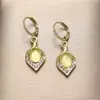 Brincos Femininos Transfronteiriços Atacado Design de Brincos Nicho Brincos com Pingente de Tulipa Luxo Leve Brincos de Alta Qualidade para Mulheres