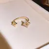 Canción de Amor Aurora~Collar con Colgante de Estrella Hueca de Circonita Super Brillante y Borla Cadena de Clavícula Chapada en Oro Real de 18K para Mujer
