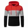 Nueva colección transfronteriza otoño/invierno: ropa cálida para hombre, disponible en AliExpress, con un diseño de retazos tricolor, una sudadera con capucha y un estilo casual y deportivo