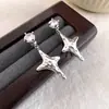 Pendientes de Estrella de Cuatro Puntas Micro-Pavimentados con Circonita Plata Aguja Estilo Coreano Lujo Accesible Pendientes de Diseño de Nicho Personalizados Exquisitos Pendientes de Gama Alta
