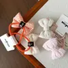 Goma para el pelo de tela dulce estilo coreano para niños, diadema versátil para niñas con estampado floral y de cuadros, con lazo de algodón tridimensional