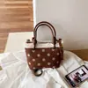 Bestseller transfronterizo 2026 nuevo modelo bolso de mano con diseño de lunares de alta costura, bolso de hombro, bolso cruzado de moda versátil para el día a día
