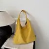 Bolso tote de gamuza minimalista de moda niche estilo coreano 2026, gran capacidad, versátil bolso de hombro y bandolera