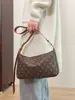 Bolsa de mano para desplazamientos transfronterizos, elegante y estilosa, bolso de alta gama para mujer 2026, gran capacidad, nuevo y versátil bolso de hombro y cruzado