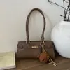 Bolsa Pequena Retrô de Alto Nível para Comércio Exterior para Mulheres 2025 Nova Bolsa Versátil de Ombro Axila Bolsa de Mão da Moda Bolsa Balde