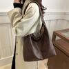 Bolso vintage de cuero PU de alta gama para mujer 2025 nueva moda color sólido gran capacidad bolso tote moda hombro axila
