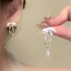 """Desciende la Diosa de la Belleza" - Belleza que Crea Atmósfera con Dulces Aretes de Borla para Mujer, Exquisitos Pinzas para Oreja tipo Mosquitero sin Perforación"""