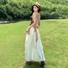 Vestido de suspensório estilo deserto para viagem no início do outono em Xinjiang e oeste de Sichuan para mulheres, verão 2026, conjunto completo super estiloso