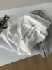 Bromu Corte Holgado Estampado de Letras Manga Corta Cepillada para Mujer Primavera 2026 Versátil Cuello Redondo Suéter Camiseta Casual