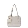 Bolso de mano para mujer, bolso retro popular, nuevo bolso cruzado versátil de otoño, bolso de cubo de mano moderno y súper popular