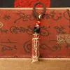 Llavero de tarro con mantra Lingyagn de aceite rojo, tarro hueco de latón puro con sutra, se puede abrir para guardar sutras, colgante de cuerda trenzada hecho a mano