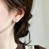Aretes de perla y circonita para mujer, aretes con pasador de plata 925, diseño de nicho, aretes de alta gama y elegantes, suministro de fábrica al por mayor