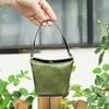 Bolsa de Moedas Feminina de Couro de Vaca Camada Superior Bolsa de Mão Couro Genuíno Bolsa Pequena Tipo Balde Bolsa para Fones de Ouvido Mini Bolsa de Moedas Portátil
