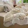 Conjunto de cuatro piezas de encaje de algodón puro estilo princesa coreana, conjunto de tres piezas de funda de edredón para dormitorio de algodón lavado estilo fresco y cremoso de Instagram