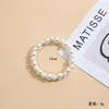 Pulsera elástica de perlas de imitación para mujer, pulsera apilable de estilo retro, joyería de lujo ligero francés para banquetes