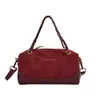 Bolsa Redonda Cilíndrica Retro Melanoid para Mano Mujer Otoño 2026 Nueva Patchwork de Gamuza Bolsa Almohada Cadena Bolso de Hombro Único Cruzado