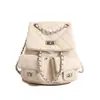 Mochila de alta calidad estilo Chanel para mujer, modelo nuevo 2026 en patrón de diamante rosa, versátil con múltiples bolsillos y asa de cadena