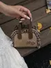 Mini Bolsa Transversal Vintage para Mulheres 2025 Nova Outono/Inverno Versátil Nicho Bolsa de Mão Selim Bolsa para Batom