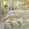 Juego de ropa de cama de cuatro piezas de algodón de doble capa estilo niña, estilo princesa de algodón puro, funda de edredón, sábana, sábana bajera y juego de tres piezas.