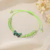 Pulsera tejida de mariposa al por mayor transfronterizo, pulsera de cuentas para parejas y amigos, pulsera de cordón de cera ajustable con mariposa de aleación