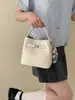 Nova bolsa de mão 2026 para mulheres, bolsa de ombro e transversal super popular e versátil para o mercado internacional, bolsa tipo balde de alta qualidade para o público de nicho para o dia a dia