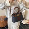 Popular Bolso Concha Portátil Transfronterizo para Mujer 2025 Nuevo Color Contrastante Nicho Versátil Bolso de Hombro Bolso Cruzado de Alta Gama