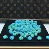Turquesa de magnesita flor de cuatro lados cuentas sueltas con cuentas espaciadoras con cuentas texto juego DIY soporte venta al por mayor