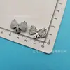 Galvanizado Oso Artificial Pajarita Copo de Nieve Corona Flor Plástico Accesorios Diadema DIY Agarrador Funda de Teléfono Celular Hebilla de Zapato Pegatina
