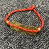 Joyería tejida a mano con monedas de los Cinco Emperadores pulsera de cuerda roja regalo pequeño accesorios de cuerda de mano con monedas de cobre Venta al por mayor de productos básicos de Yiwu