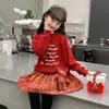Ropa para Niñas Conjunto de Suéter Otoño e Invierno 2026 Nuevo Elegante Falda Roja Plisada Infantil Conjunto de Dos Piezas para Año Nuevo