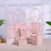 Bolsa de mano para arreglos florales impermeable multicolor de macarrón en stock, especial para el Día del Maestro, Navidad y plantas suculentas