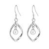 Suministro de Fábrica Aretes Creativos de Perlas Giratorias Elegantes Hojas Huecas Aretes de Tuerca para Mujer Aretes Planos Torcidos