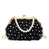 Bolsa pequeña, nuevo modelo de otoño 2026, bolso de concha floral de alta costura, bolso cruzado con cadena de perlas estilo Chanel