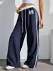 Atacado de calças casuais femininas estampadas da moda estilo americano, de cintura alta, para primavera e outono, com color blocking esportivo e design de perna reta