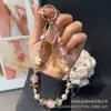 Año del Caballo Mascota Flor de Aleación Pony Cadena para Teléfono Colgante de Cristal Perla Encanto para Bolsa de Año Nuevo Llavero Correa