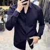 Camisa de marca francesa de alta gama con botones ocultos para hombre, corte slim fit, estilo business casual, resistente a las arrugas, camisa blanca de manga larga, nuevo modelo de primavera