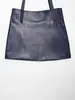 Conjunto de Chaleco con Correa de Efecto Piel Estilo Europeo y Americano Nuevo Verano 2026 + Minifalda de Efecto Piel con Remaches