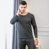 Traje de ropa interior térmica de terciopelo dorado para hombre con forro polar engrosado a prueba de frío ropa de otoño para parejas pantalones largos ropa cálida para mujer talla grande