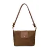 Bolso bandolera retro estilo francés para mujer, un bolso de hombro de gamuza chic y único con diseño de estampado de leopardo, perfecto para llevar debajo del brazo, nueva colección otoño 2026