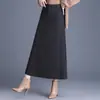 Elegante y minimalista falda midi de lana línea A, nueva colección otoño/invierno 2026, de cintura alta, estiliza y cubre la cadera, adecuada para ropa de trabajo