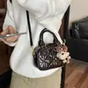 Bolso pequeño de rejilla de diamantes para mujer 2026 nuevo bolso de hombro individual de moda mini bolso tipo bowling bolso cruzado pequeño versátil