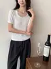 Ropa de Mujer de Alta Gama Nanyou Verano 2026 Nuevo Top Chic de Punto Trenzado con Perlas y Manga Corta para el Trabajo