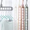Celebridad de Internet multifuncional plegable mágico de nueve agujeros perchero almacenamiento tendedero ropa hogar dormitorio organización artefacto de almacenamiento