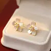 Pendientes coreanos Dongdaemun ins de Chica de Hadas Pétalo de Fritillaria Natural Celebridad de Internet Elegantes Versátiles Populares para Mujer