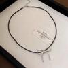 Colgante de lazo de moda francesa con cuentas redondas, cadena de clavícula de cuero, estilo femenino, exquisito y sencillo collar de alta calidad.