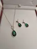 Collar y pendientes de lágrima de esmeralda, zafiro, rubí y cristal negro de lujo ligero europeo y americano con un toque de alta gama