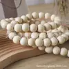 Cuerda de cáñamo color tronco con borla y colgante de cuenta de madera Accesorios para joyería DIY Cuerda de borla con cuentas de madera Colgante de decoración para el hogar Venta al por mayor