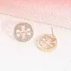 Moda Europea y Americana Sencillo para Viajar Diseño de Nicho Diamante Incrustado Hueco Pendientes Redondos Pequeños Gama Alta Venta al por Mayor