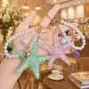 Llavero Pulsera Personalizada de Perlas y Estrella de Mar Estilo Verano Océano Colgante de Estrella de Mar de Resina AliExpress Regalos Pequeños Transfronterizos